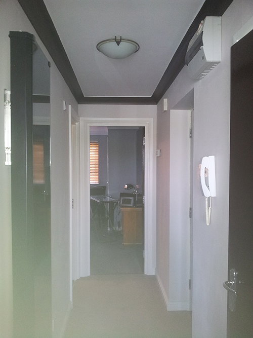  PAINTED THE WALLS ONE COLOUR AND THE COVING BROWN.
